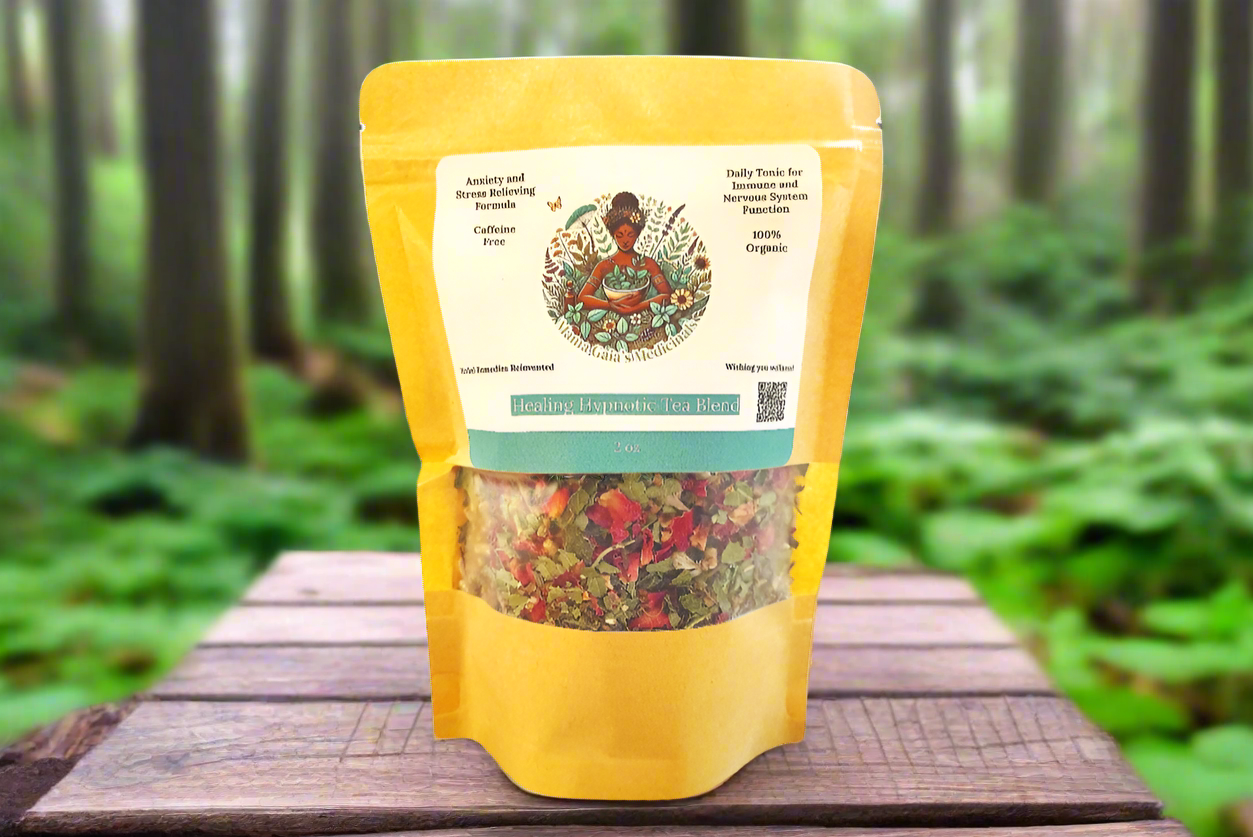 A 2oz bag of Healing Hypnotic Tea Blend on a wooden table outdoor in nature.